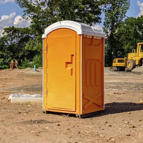 what is the cost difference between standard and deluxe portable toilet rentals in Lake Emma